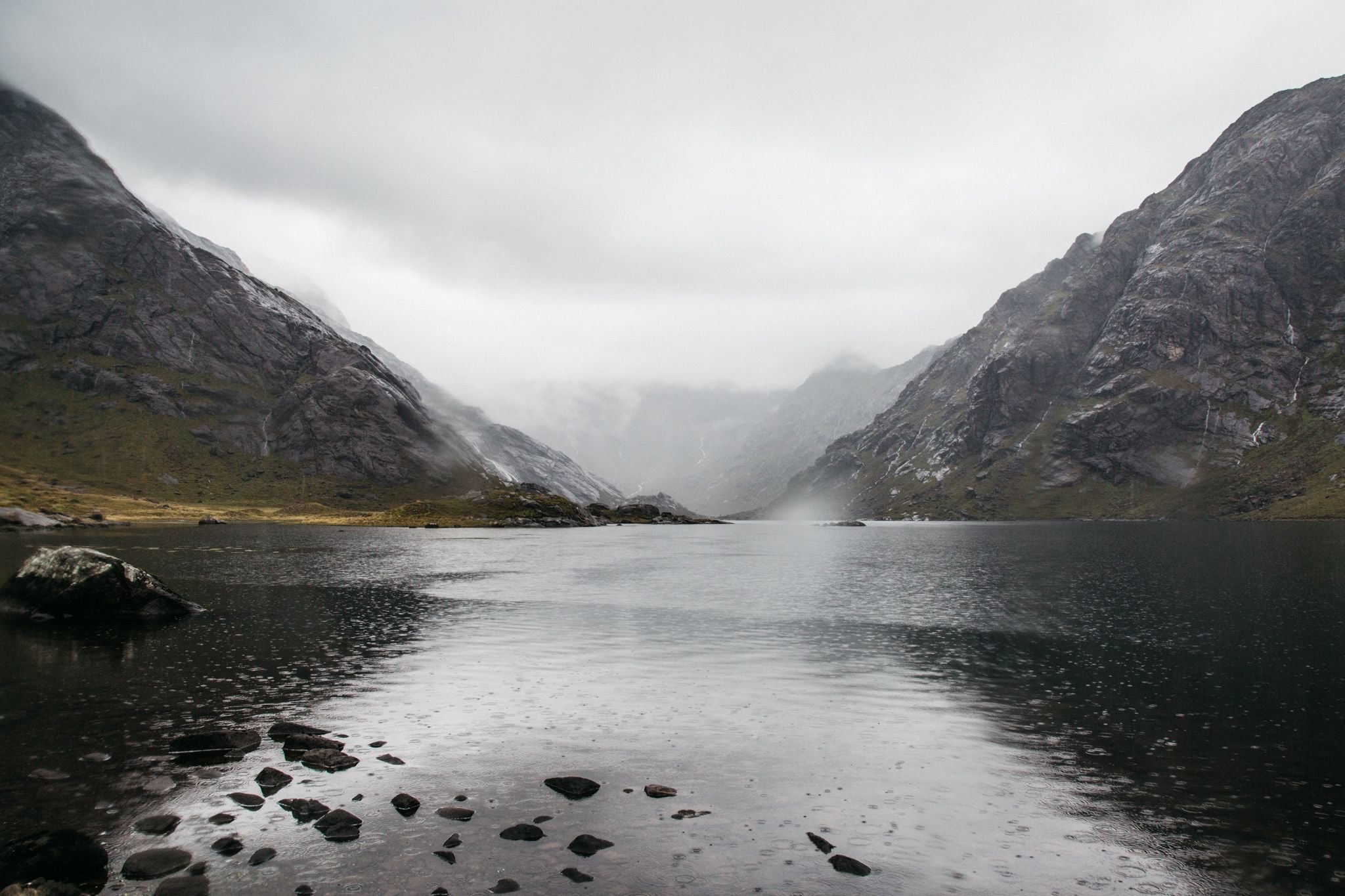 Mist and rain over Loch Coruisk and the Cuillin mountains on the Isle of Skye